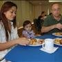 Cresilda Paulino enjoys breakfast with husband Master Sgt. Manuel Paulino, 3/69 Armor, along with daughter Natalie, on day two of the Strong Bonds Marriage Retreat at the Sawgrass Marriott Resort and Spa, Feb. 26. 
